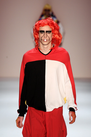 Illustration for article titled Scary Card-Playing Clowns, Lady Gaga Monsters, And Saran-Wrap Savages: Has Fashion Gone Insane?